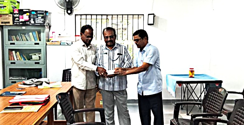 Paying the chit amount to the lucky winner P Shyam Kumar Garu by GV Rao Garu and K Pandurangaiah Garu .jpeg